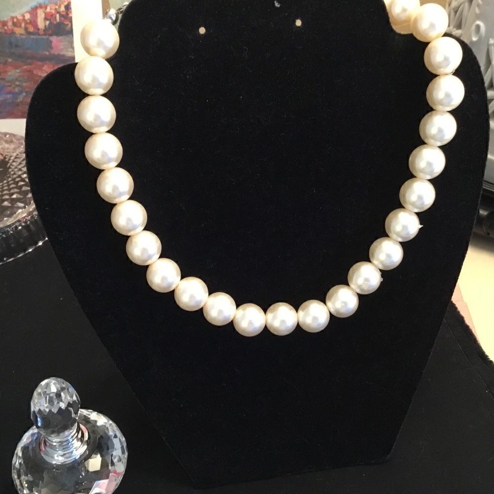 White Faux Pearl Necklace with Silvertone Hardware.